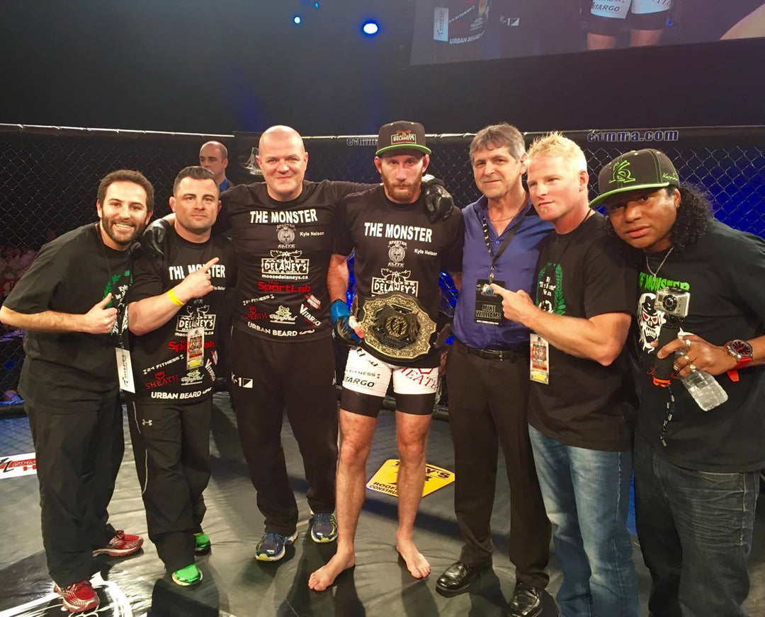 SHEATH Sponsored Kyle the Monster Nelson Takes Featherweight Belt in Elite 1 Championship