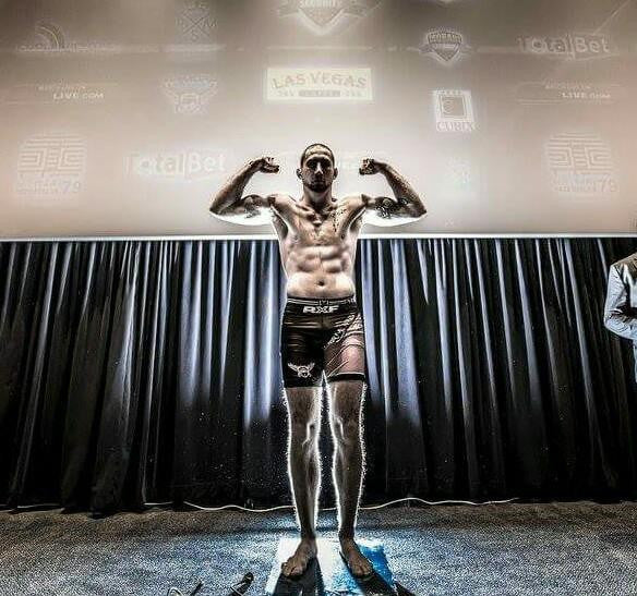 articles/kylenelsonweighin.jpg
