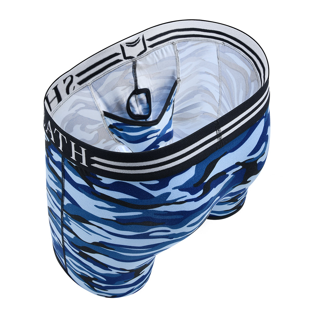 Blue camo men's trunks with ergonomic dual pouch support, breathable moisture-wicking fabric, and a black-and-white branded waistband for all-day anti-chafing comfort.#color_ocean-blue