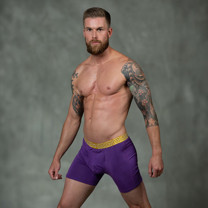 Male model wearing SHEATH purple &amp; gold men&