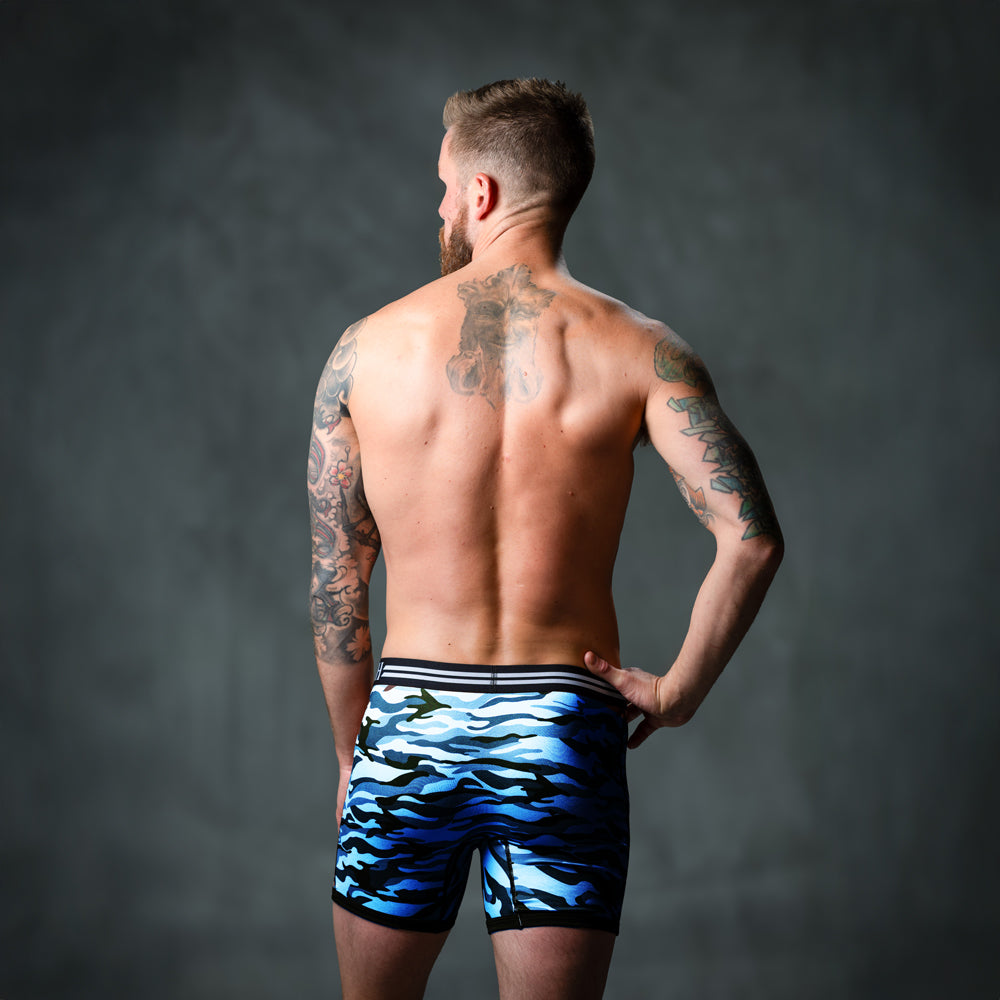 Male model in front of studio backdrop wearing men&