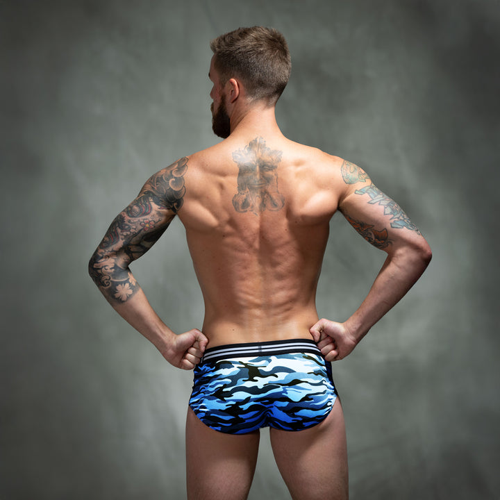 Male model in front of studio backdrop wearing men&
