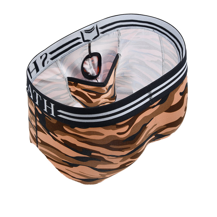 Red camo men's American briefs with ergonomic dual pouch support, breathable moisture-wicking fabric, and a black-and-white branded waistband for all-day anti-chafing comfort.#color_desert-red