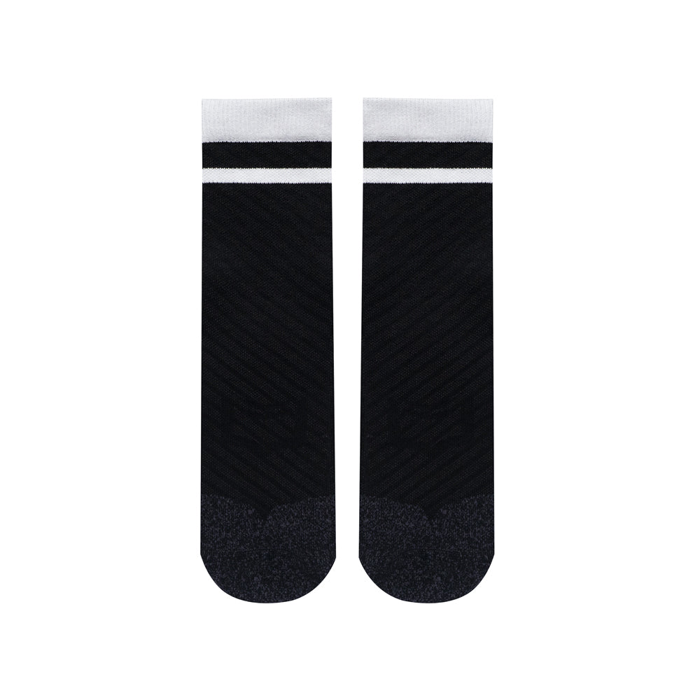 SHEATH Pair of black varsity crew socks with two white strips around calf featuring breathable knit fabric with subtle texture and cushioned footbed for enhanced comfort and moisture management during active use.#color_black-varsity