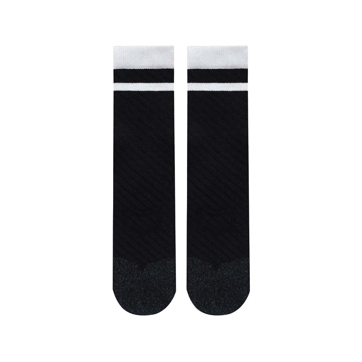 SHEATH Pair of black varsity crew socks with two white strips around calf featuring breathable knit fabric with subtle texture and cushioned footbed for enhanced comfort and moisture management during active use.