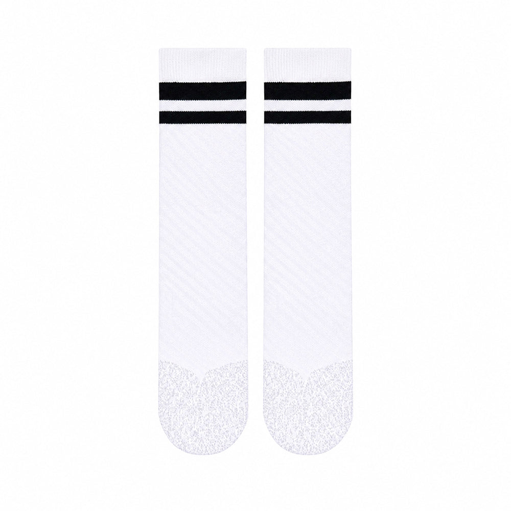 SHEATH Pair of white varsity crew socks with two black strips around calf featuring breathable knit fabric with subtle texture and cushioned footbed for enhanced comfort and moisture management during active use.