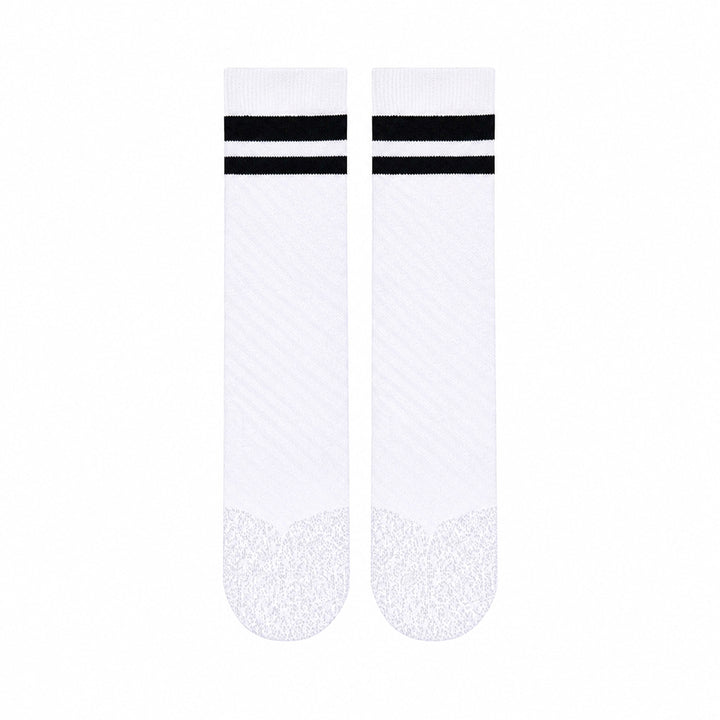 SHEATH Pair of white varsity crew socks with two black strips around calf featuring breathable knit fabric with subtle texture and cushioned footbed for enhanced comfort and moisture management during active use.