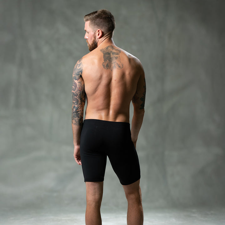 Backside of male model wearing SHEATH black classic modal men&