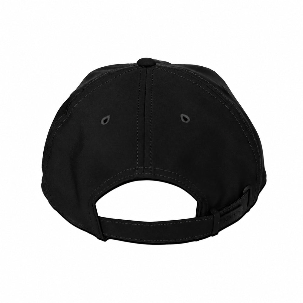 Back side of white cap melin hydro legend stealth cap on a black background