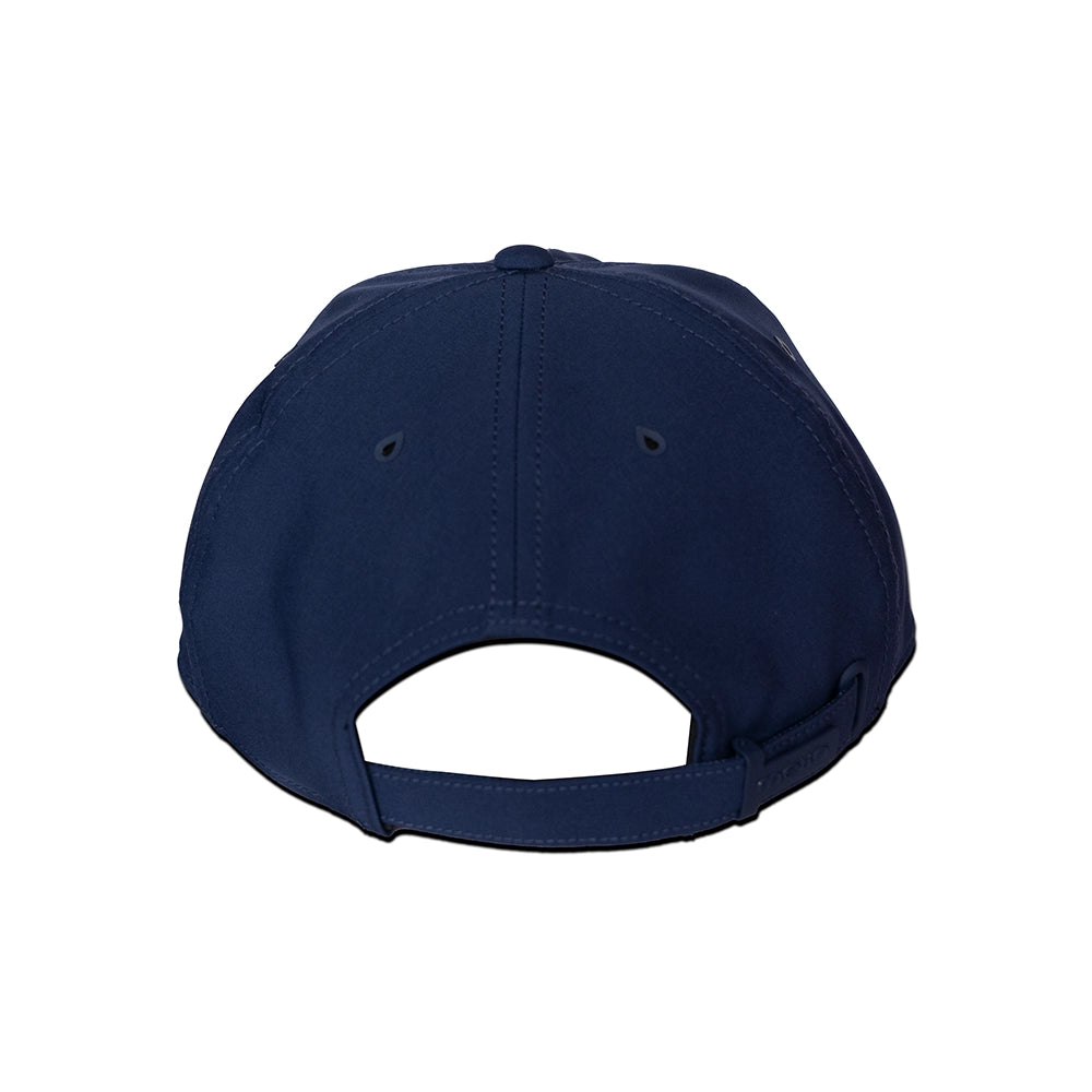 Back side of navy blue cap melin hydro legend stealth cap on a white background#color_navy