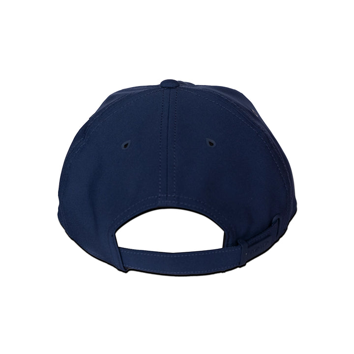 Back side of navy blue cap melin hydro legend stealth cap on a white background#color_navy