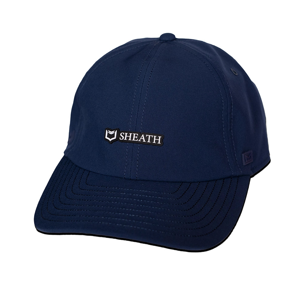 Front side of navy blue cap melin hydro legend stealth cap with 'SHEATH' logo on a white background#color_navy