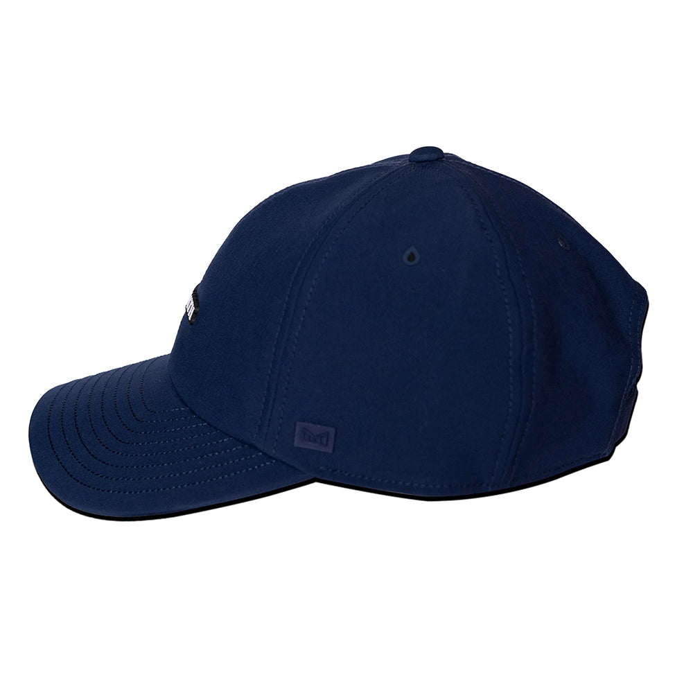 Left side of navy blue cap melin hydro legend stealth cap logo on a white background#color_navy