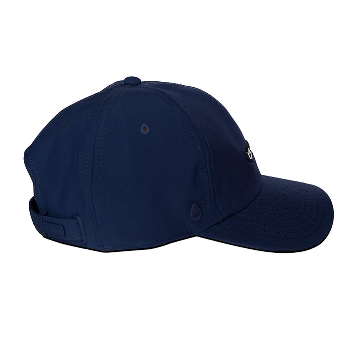 Right side of navy blue cap melin hydro legend stealth cap on a white background#color_navy